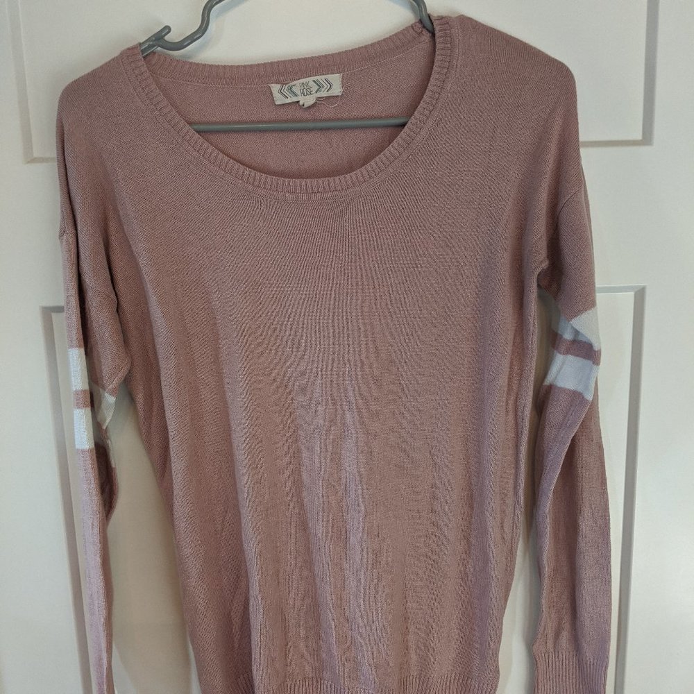 Pink sweater with white stripes on sleeves